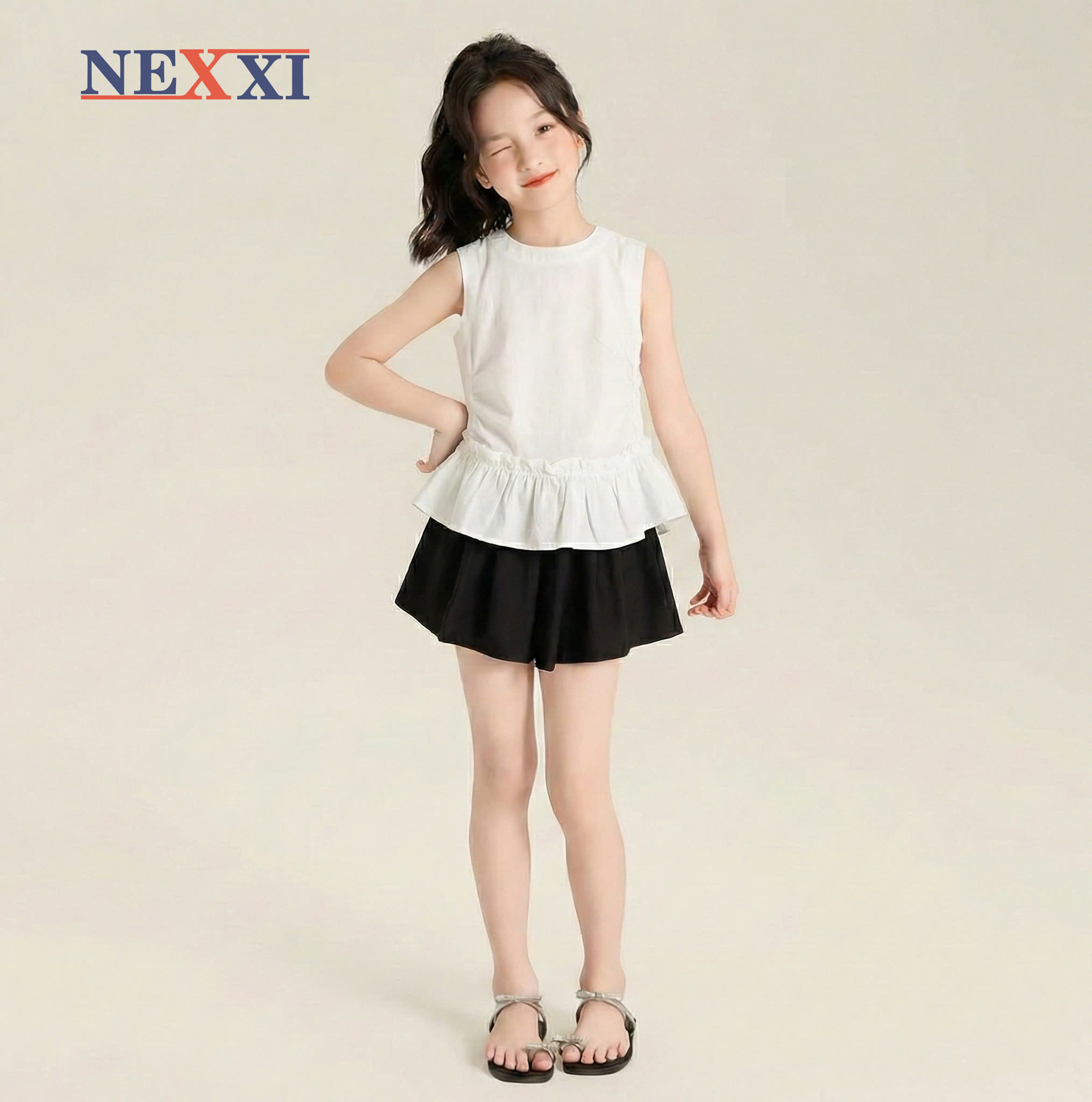 2603.11Áo kiểu nhún eo sát nách xòe