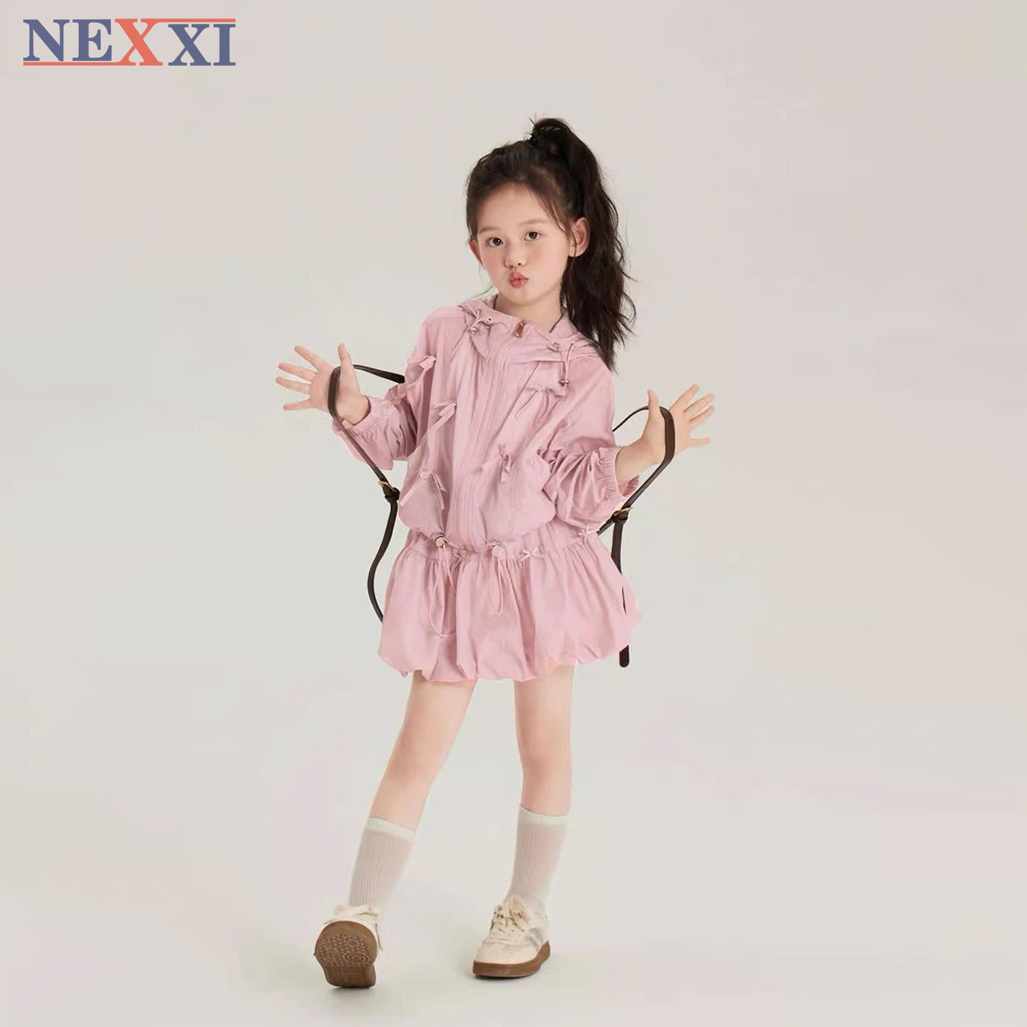 2509.4Sét vải dù áo khoác nơ và váy bí