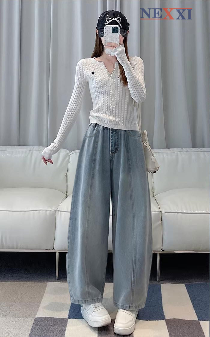 2604.2Quần jean dài ống cong rã giữa